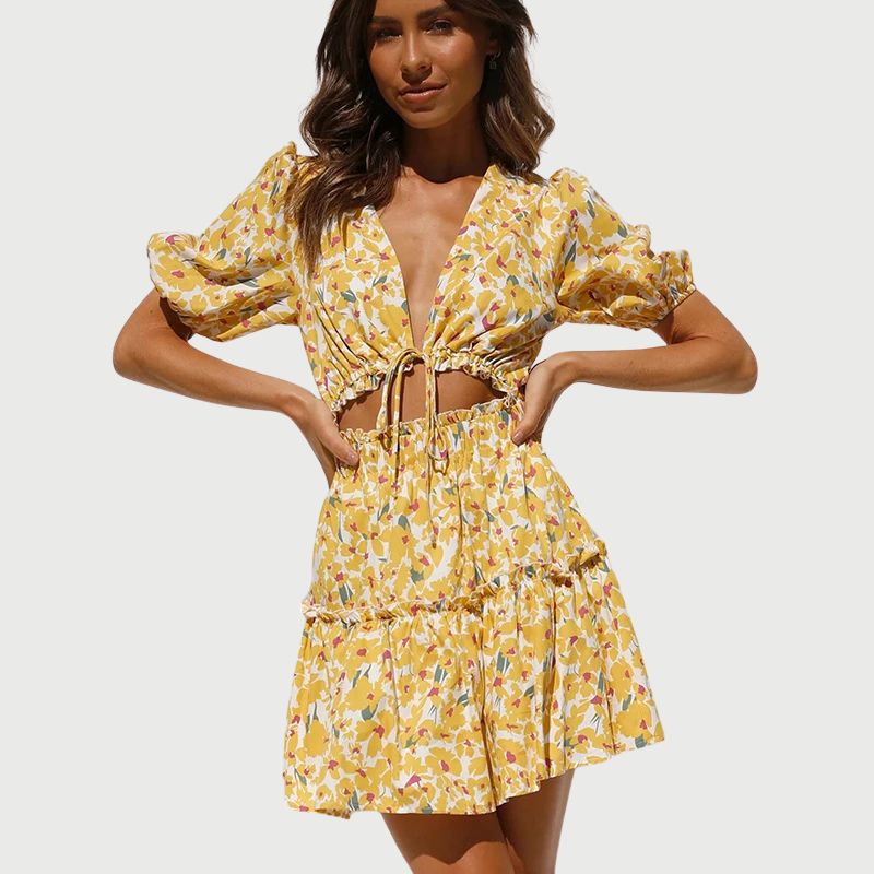 Delilah - Sonniger Blumen-Romper mit Bindungsdetail vorn